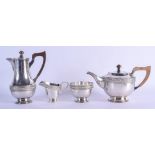 AN ART DECO FOUR PIECE SILVER TEASET in the Arts and Crafts style. Birmingham 1923. 1230 grams. Larg
