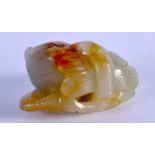 A 19TH CENTURY CHINESE CARVED JADE FIGURE OF A BEAST. 4.5 cm x 3 cm.