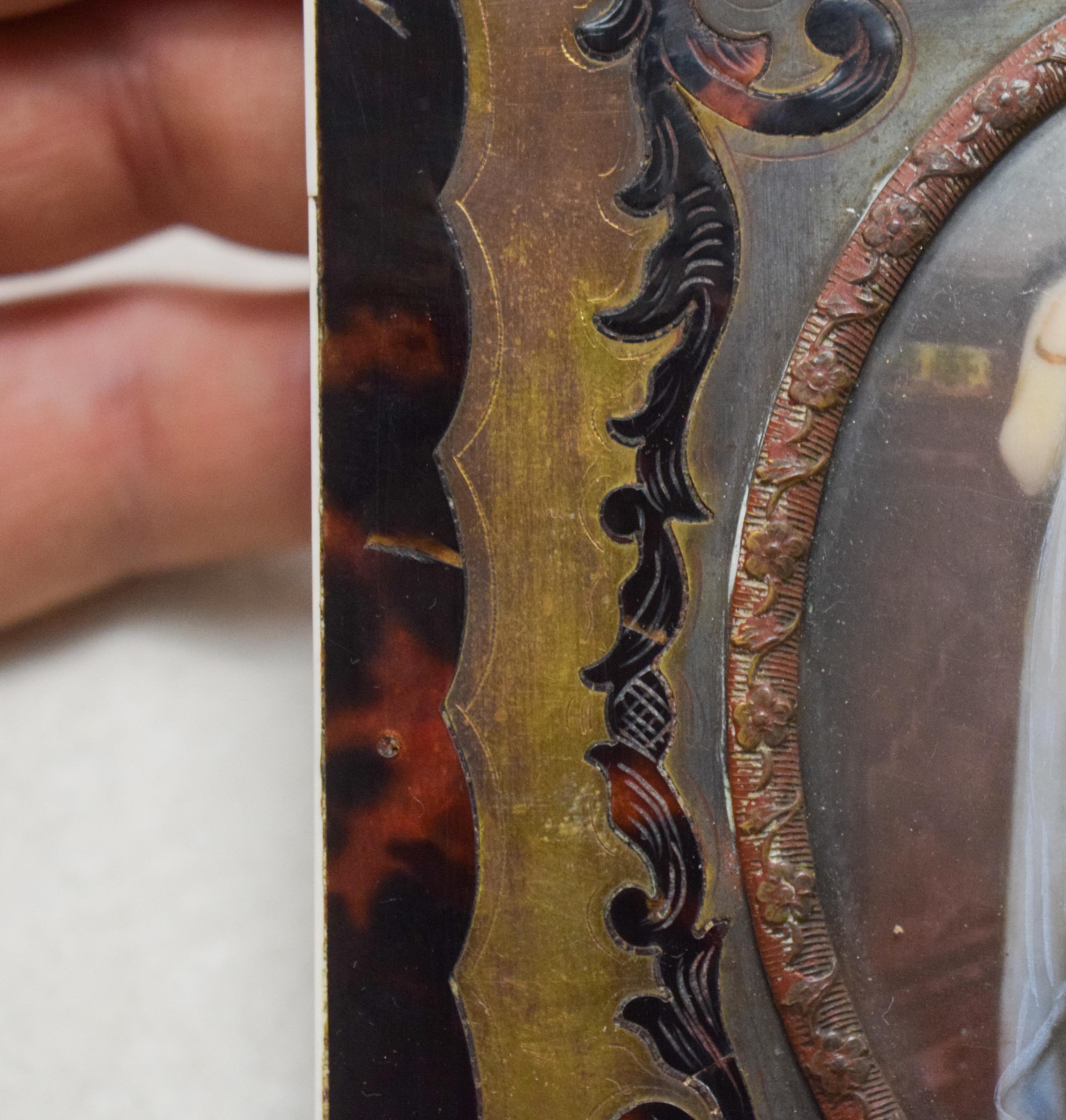 AN ANTIQUE CONTINENTAL PAINTED IVORY PORTRAIT MINIATURE within a Boulle frame. Image 8.5 cm x 6.5 cm - Image 9 of 10