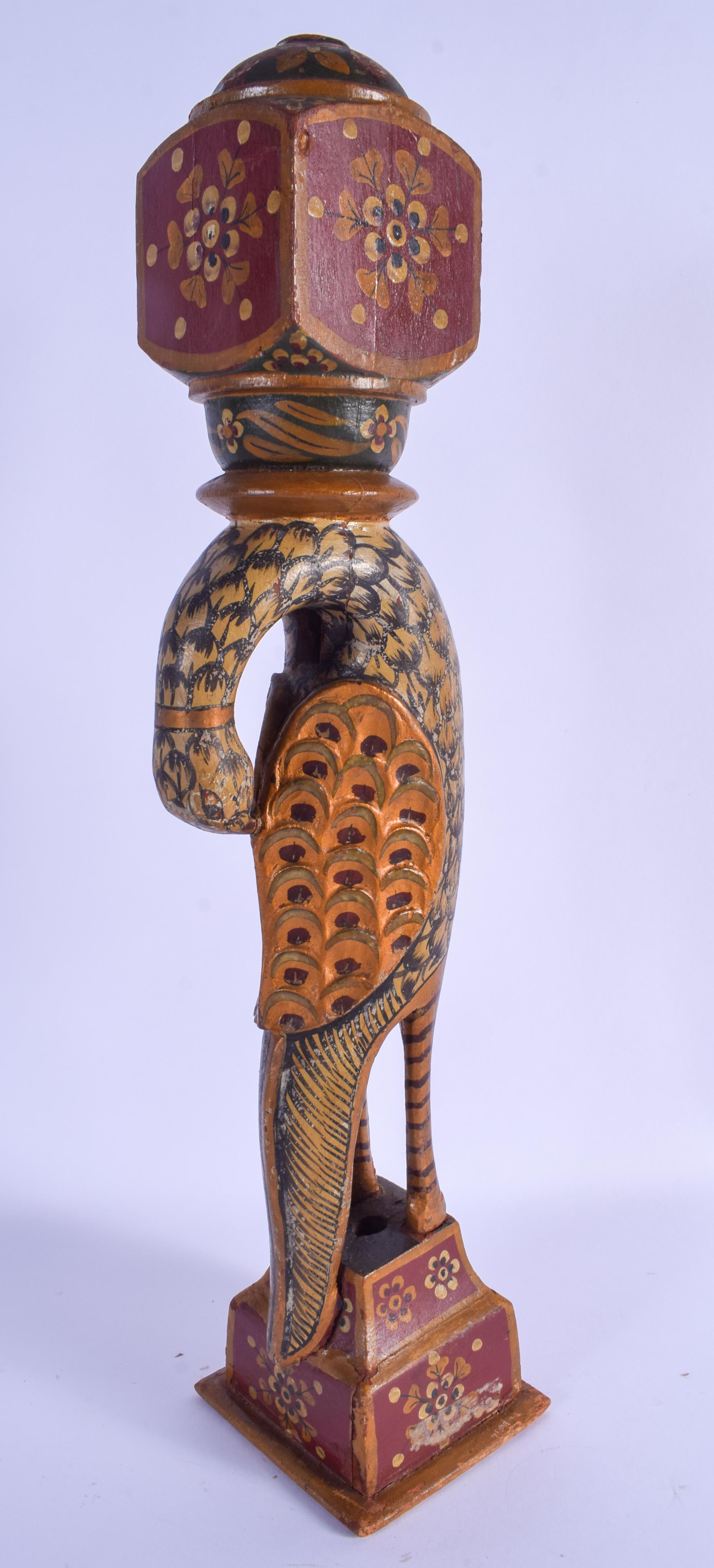 A LARGE EARLY 20TH CENTURY INDIAN PERSIAN LACQUERED WOOD FIGURE OF A BIRD painted with flowers. 47 c