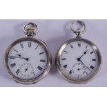 AN ANTIQUE SILVER POCKET WATCH and another plated watch. Largest 5.25 cm diameter. (2)