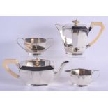 A STYLISH ART DECO SILVER AND IVORY TEASET C1934 by Emile Viner. 1615 grams. Largest 21 cm x 15 cm.
