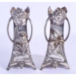 A STYLISH PAIR OF ART NOUVEAU WMF SILVER PLATED VASES decorated with musicians. 18.5 cm high.