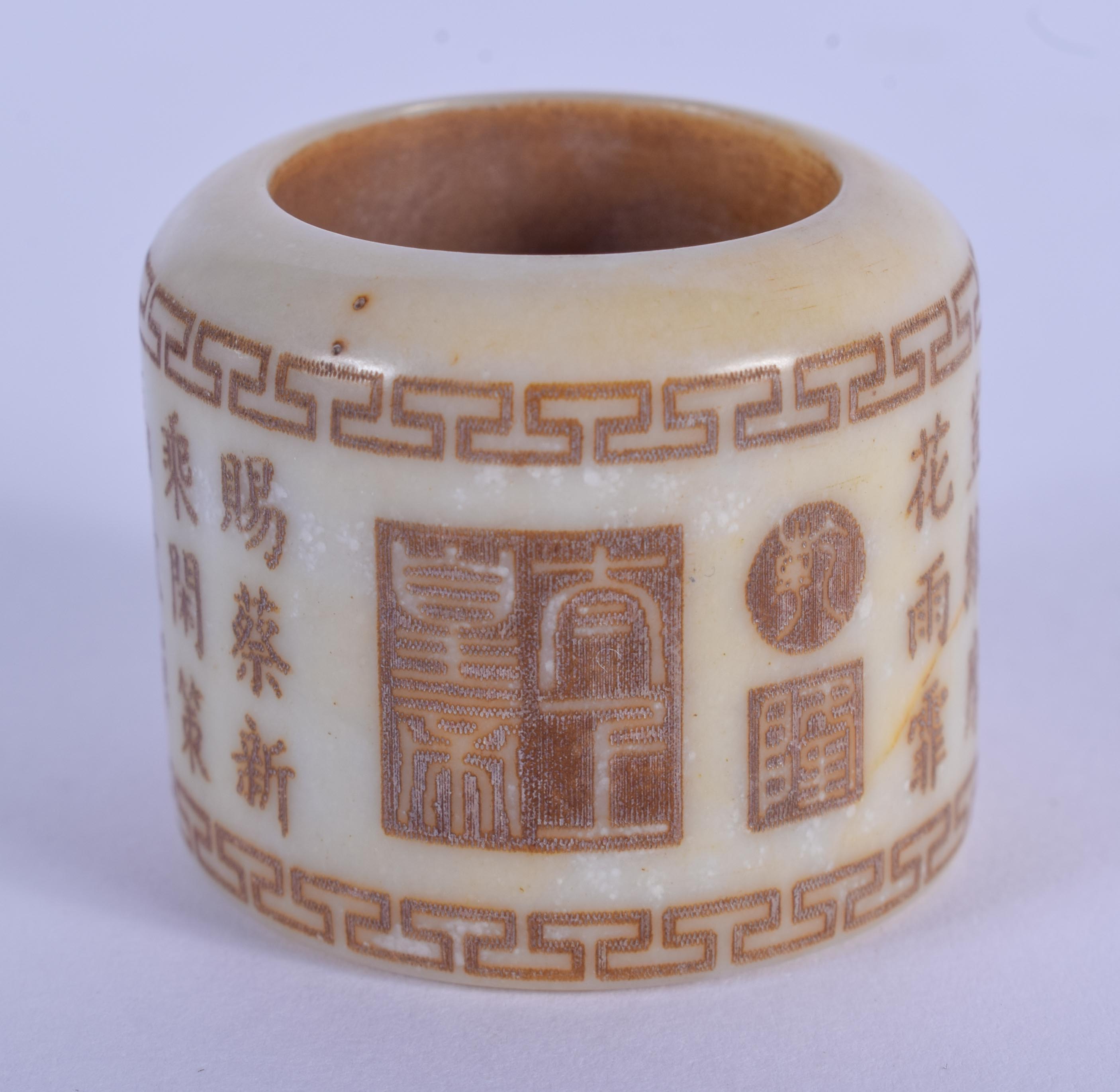 A CHINESE JADE ARCHERS RING 20th Century. 3.5 cm wide.