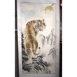 A CHINESE WATERCOLOUR SCROLL PAINTING Attributed to Gao Ru Song, a tiger in a landscape. 127 cm x 61