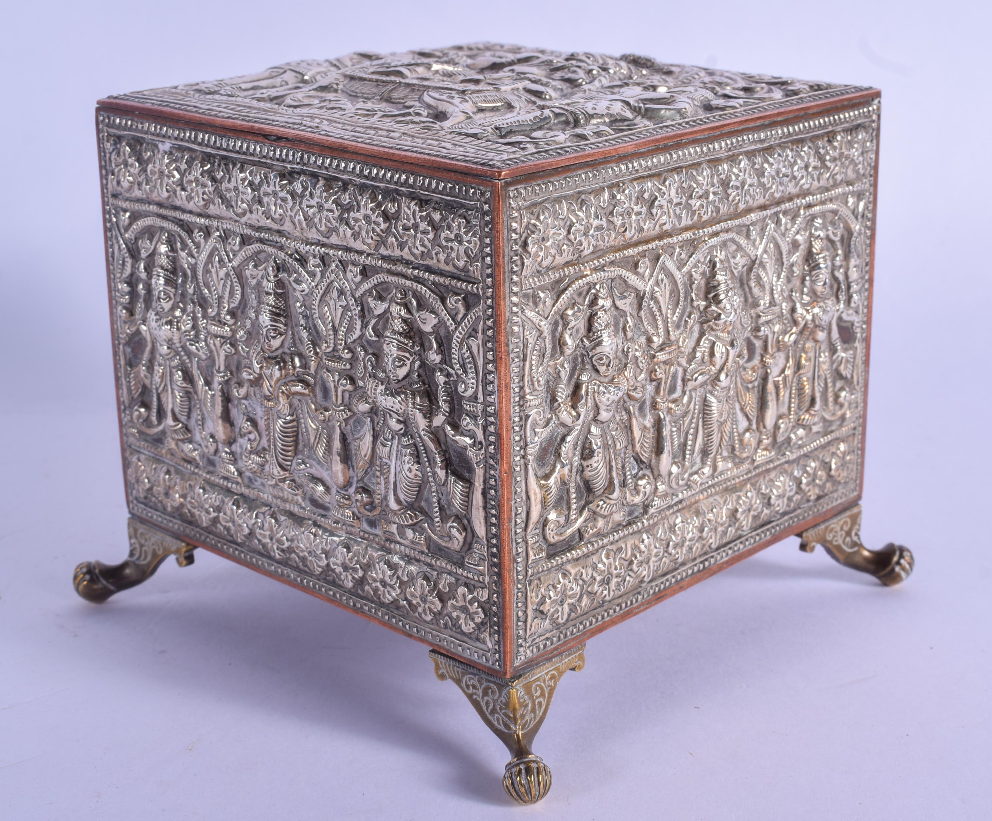 A 19TH CENTURY INDIAN SILVER OVERLAID CASKET decorated with Buddhistic figures. 12 cm x 9 cm. - Image 5 of 5