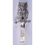 A SILVER OWL BABIES RATTLE. 6.5 cm wide.