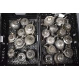 A COLLECTION OF ANTIQUE PEWTER TEAPOTS in various forms and sizes. Largest 17 cm wide. (qty)