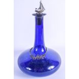 AN UNUSUAL ENGLISH SILVER MARITIME BRISTOL BLUE DECANTER. 26 cm high.