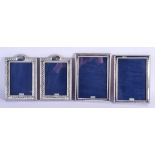 TWO PAIRS OF SILVER PHOTOGRAPH FRAMES. 22 cm x 12 cm. (4)