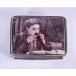 A SILVER CHARLIE CHAPLIN SNUFF BOX. 3 cm x 2.5 cm.