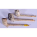 THREE VINTAGE PIPES. (3)