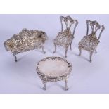 A CHARMING SET OF ENGLISH SILVER MINIATURE FURNITURE. Birmingham 1976. 54 grams. Largest 6 cm x 4 cm