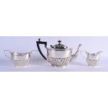 A THREE PIECE SILVER PLATED TEASET. Largest 21 cm wide. (3)