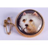 A CHARMING GOLD MOUNTED VICTORIAN W B FORD ENAMELLED DOG BROOCH. 6.4 grams. 2.25 cm diameter.