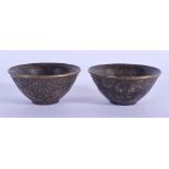 TWO CHINESE BRONZE BOWLS 20th Century. 5.5 cm diameter. (2)