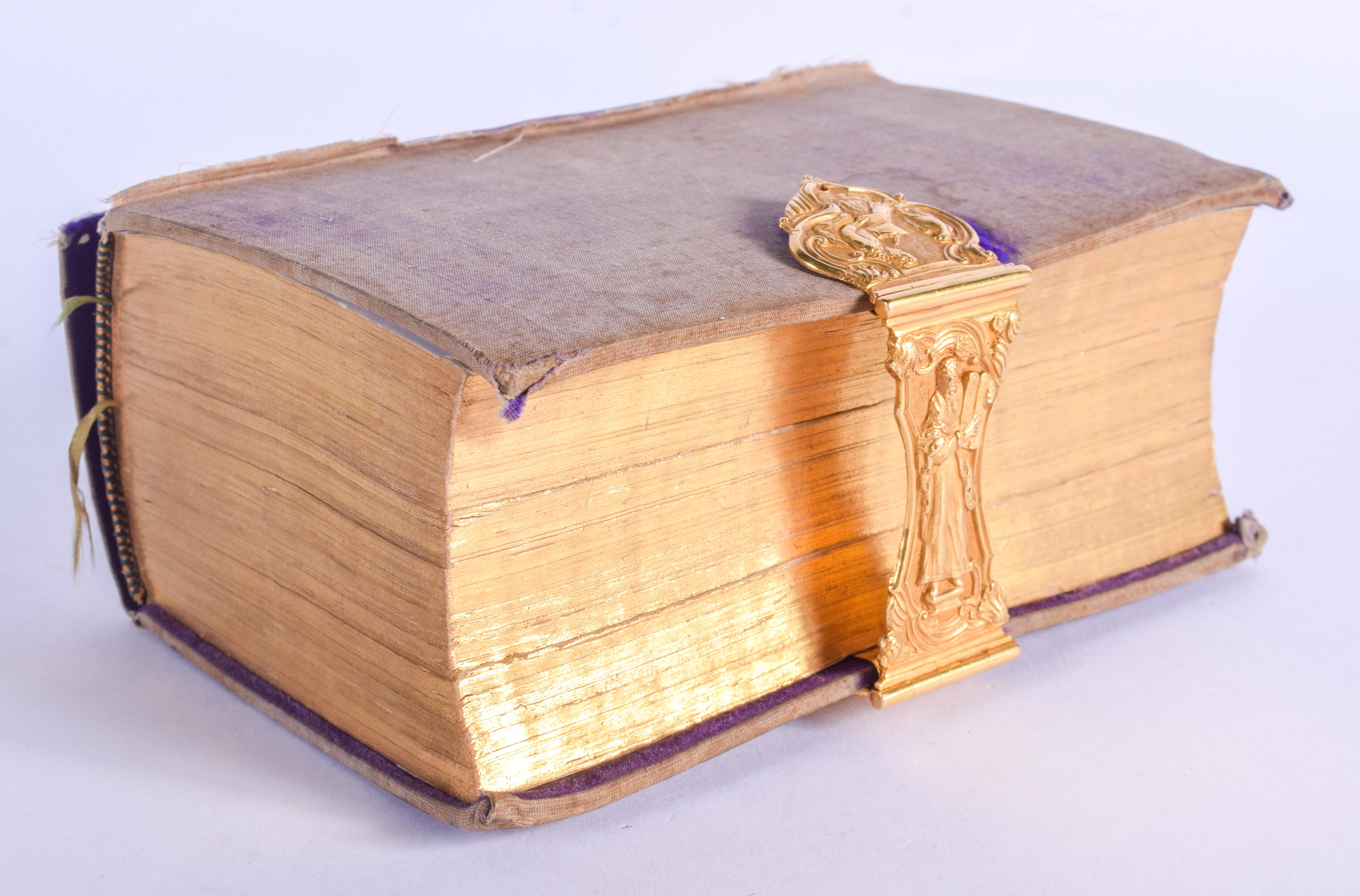 A 19TH CENTURY DUTCH EDITION OF THE NEW TESTAMENT with 18th century Continental gold mounts. 13 cm x