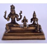 A 19TH CENTURY MIDDLE EASTERN INDIAN BRONZE FIGURE OF BUDDHISTIC DEITIES. 15 cm x 12 cm.