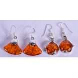 TWO PAIRS OF SILVER AND AMBER EARRINGS. (4)