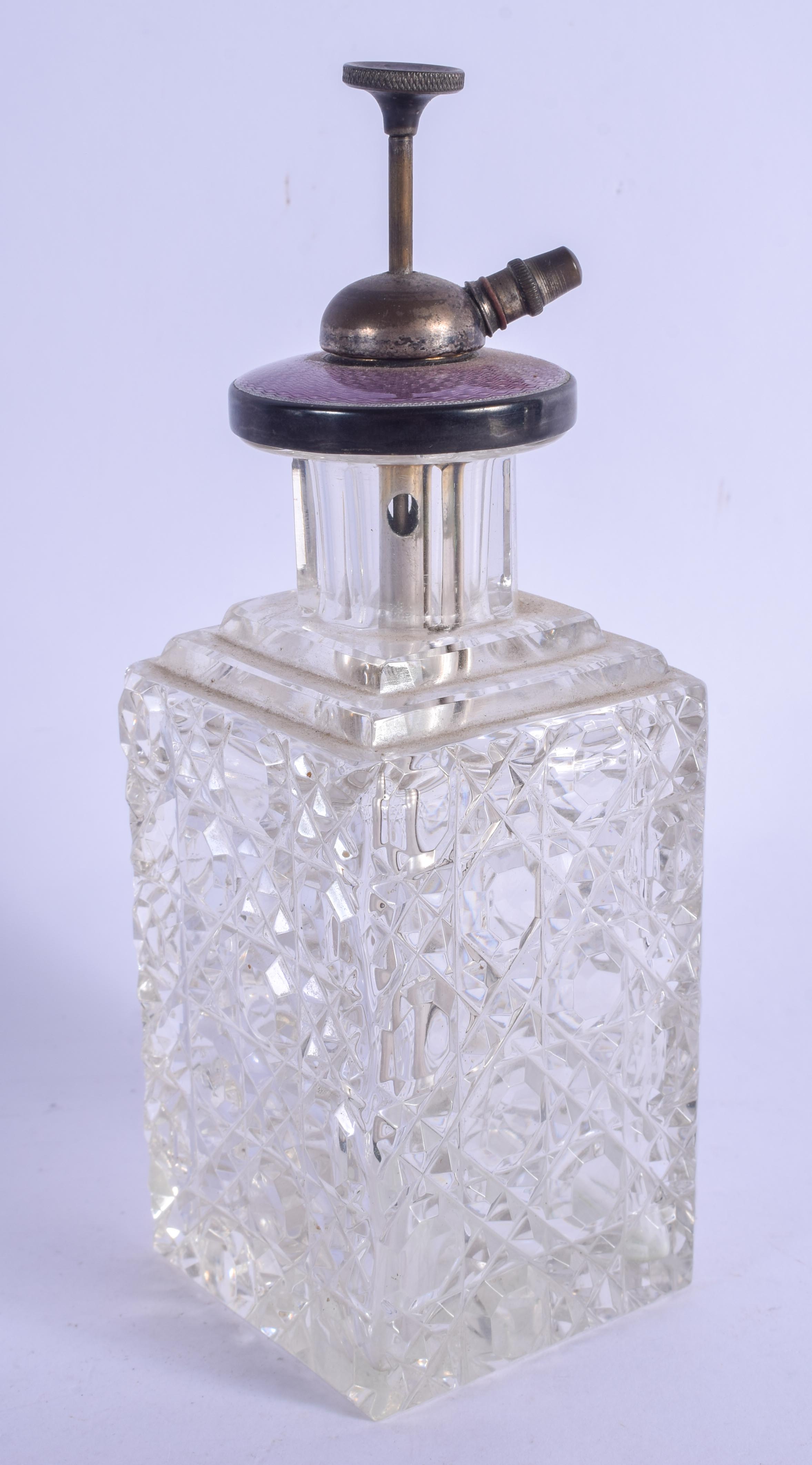 AN ART DECO SILVER AND ENAMEL SCENT BOTTLE. 18 cm high.