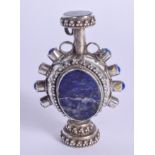 A MIDDLE EASTERN SILVER AND LAPIS LAZULI SCENT BOTTLE. 24 grams. 6.5 cm high.