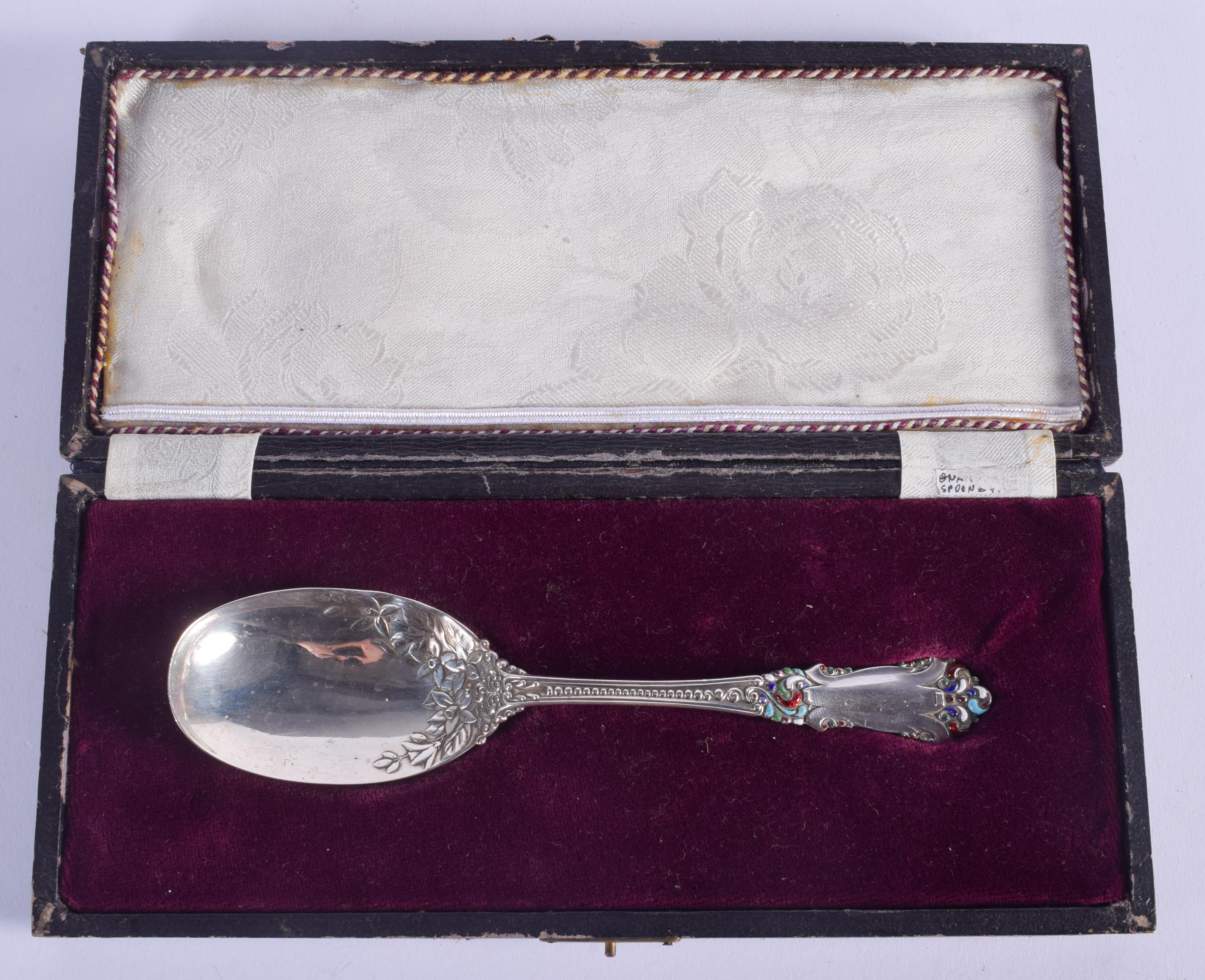 AN UNUSUAL STERLING SILVER ENAMELLED SPOON. 41 grams. 16 cm long.