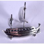 A SILVER GALLEON. 3.25 cm x 2.5 cm.