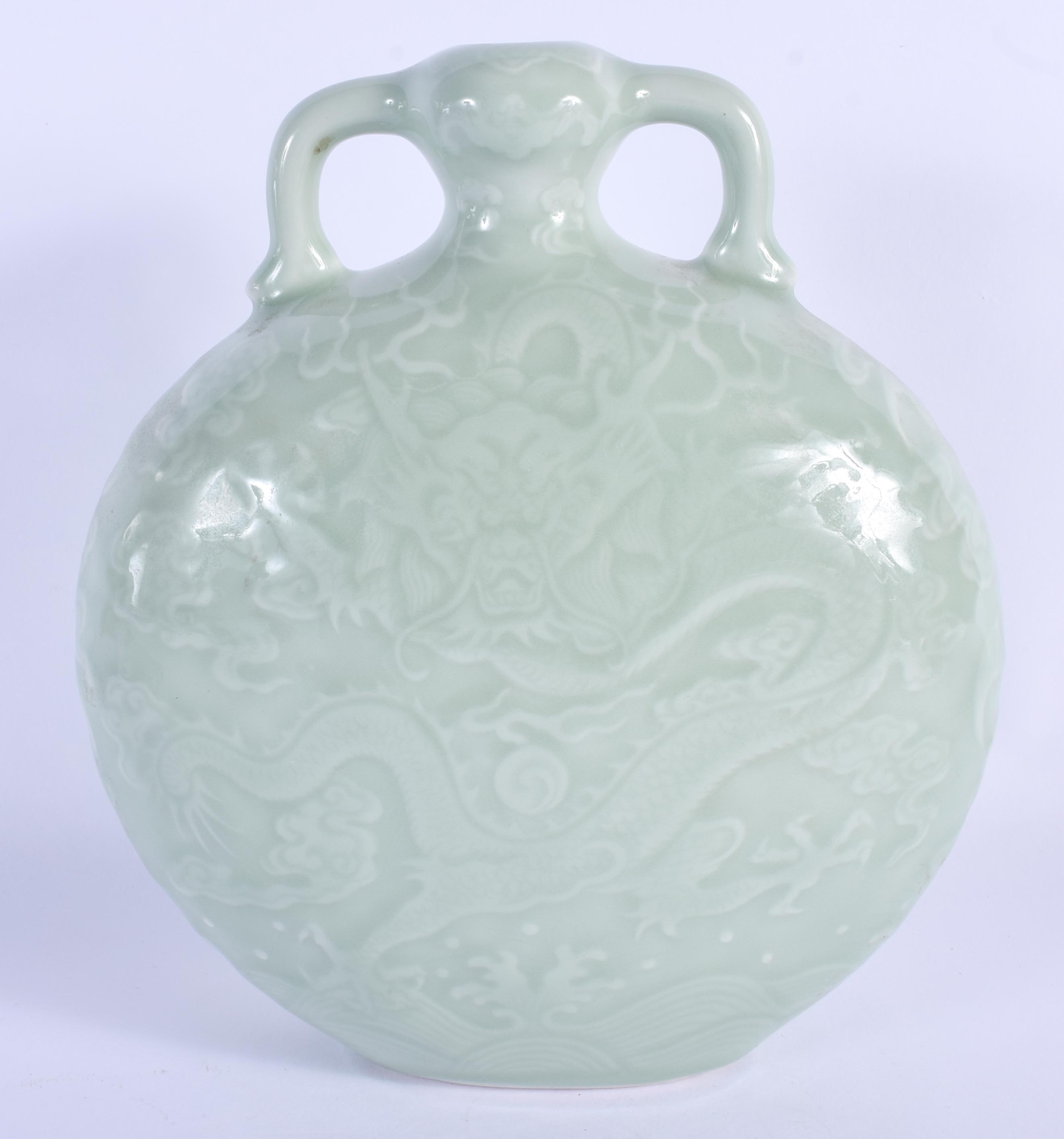 A CHINESE TWIN HANDLED CELADON MOON PILGRIM FLASK 20th Century, bearing Qianlong marks to base, deco