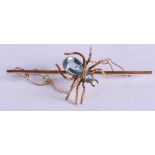 A VINTAGE 9CT GOLD AND SILVER AQUAMARINE MARINE SPIDER BROOCH. 4 grams. 6 cm wide.