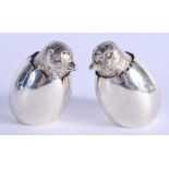 A VERY RARE PAIR OF EDWARDIAN SILVER CHICK CRUETS. London 1905. 81 grams. 6 cm x 4 cm.