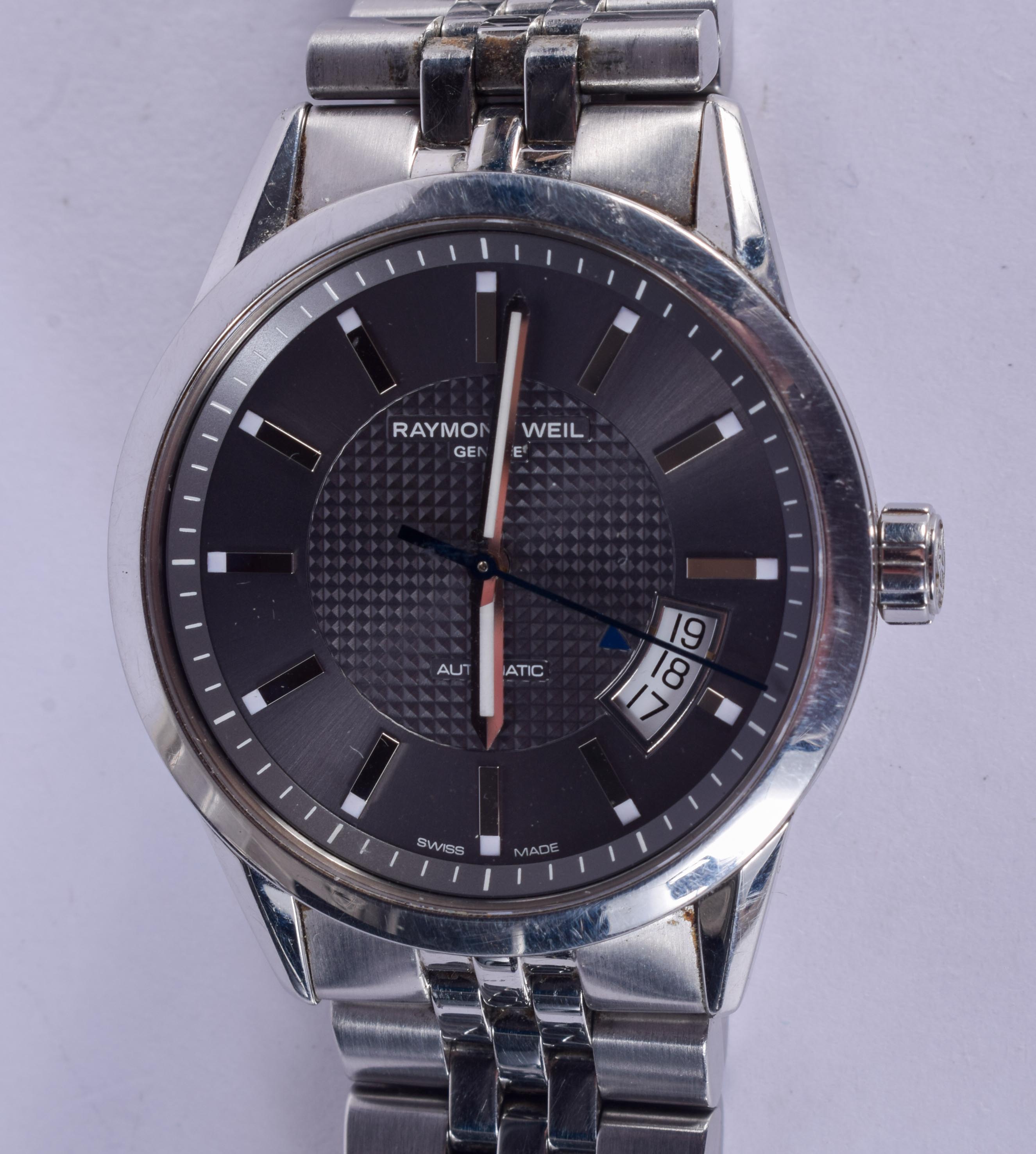 A RAYMOND WEIL STAINLESS STEEL WRISTWATCH. 3.75 cm diameter.