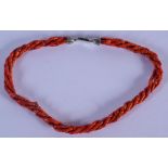 AN ART DECO CORAL CHOKER NECKLACE. 38 cm long.