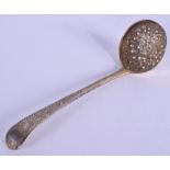 AN EDWARDIAN SILVER SIFTING SPOON. London 1908. 45 grams. 15 cm long.