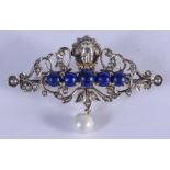 AN UNUSUAL 19TH CENTURY EUROPEAN SILVER PEARL AND LAPIS LAZULI BROOCH. 9 grams. 4.5 cm wide.