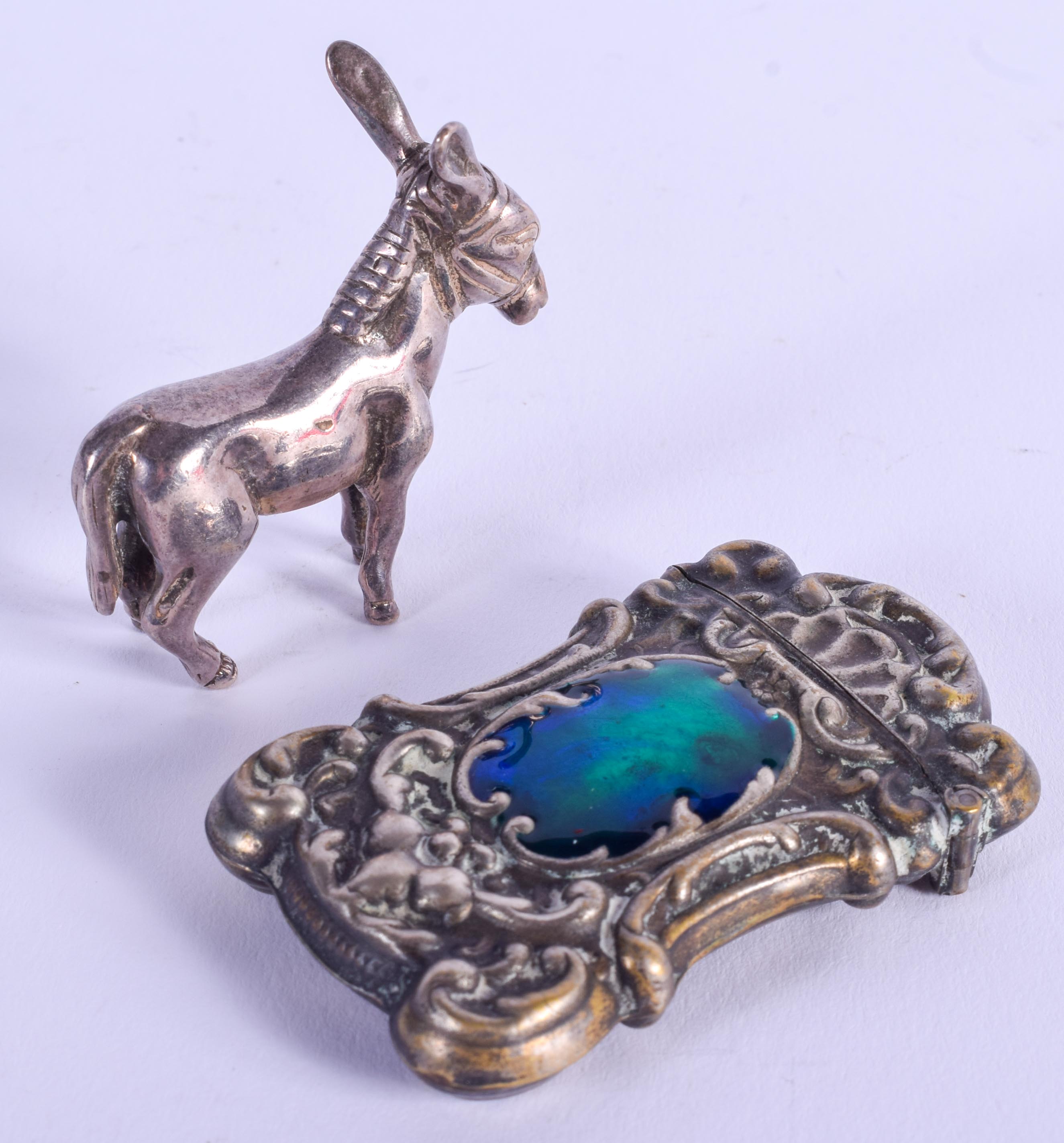 AN ENGLISH SILVER DONKEY together with an enamelled vesta. (2) - Image 2 of 3