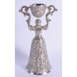 AN UNUSUAL 19TH CENTURY CONTINENTAL WHITE METAL FIGURAL WAGERING CUP embellished in foliage. 277 gra