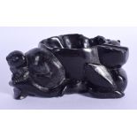 AN EARLY 20TH CENTURY CHINESE CARVED BLACK STONE BRUSH WASHER. 9 cm x 6 cm.