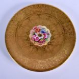 Royal Worcester fine highly gilt plate, acid etched, the centre painted with flowers by John Freema