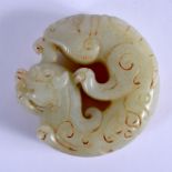 A CHINESE CARVED GREEN JADE S DRAGON TYPE CARVED BEAST possibly late Qing. 5 cm x 5.5 cm.