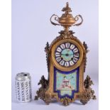 A 19TH CENTURY FRENCH ORMOLU SEVRES PORCELAIN MANTEL CLOCK painted with flowers. 37 cm x 11 cm.