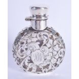 AN ART NOUVEAU SILVER OVERLAID HIP FLASK. 9.5 cm x 6.5 cm.