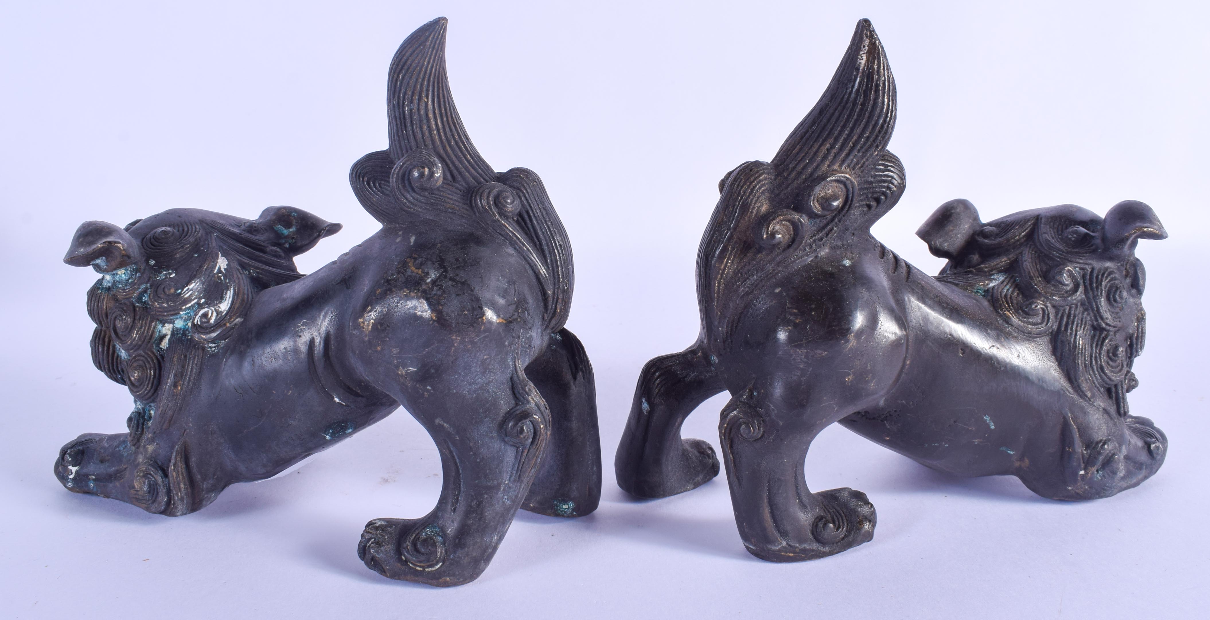 A PAIR OF CHINESE BRONZE BUDDHISTIC DOGS OF FOE 20th Century. 16 cm x 11 cm. - Image 2 of 3