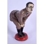 A CONTEMPORARY COLD PAINTED METAL HITLER PIN CUSHION. 12 cm high.