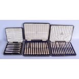 TWO CASED SETS OF SILVER KNIVES and another set. Sheffield 1924 & London 1925. 450 grams not inc ivo