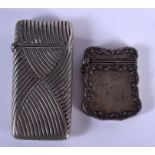 TWO SILVER VESTA CASES. (2)