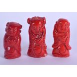 THREE VINTAGE CHINESE CORAL CARVINGS. Largest 5.5 cm long. (3)