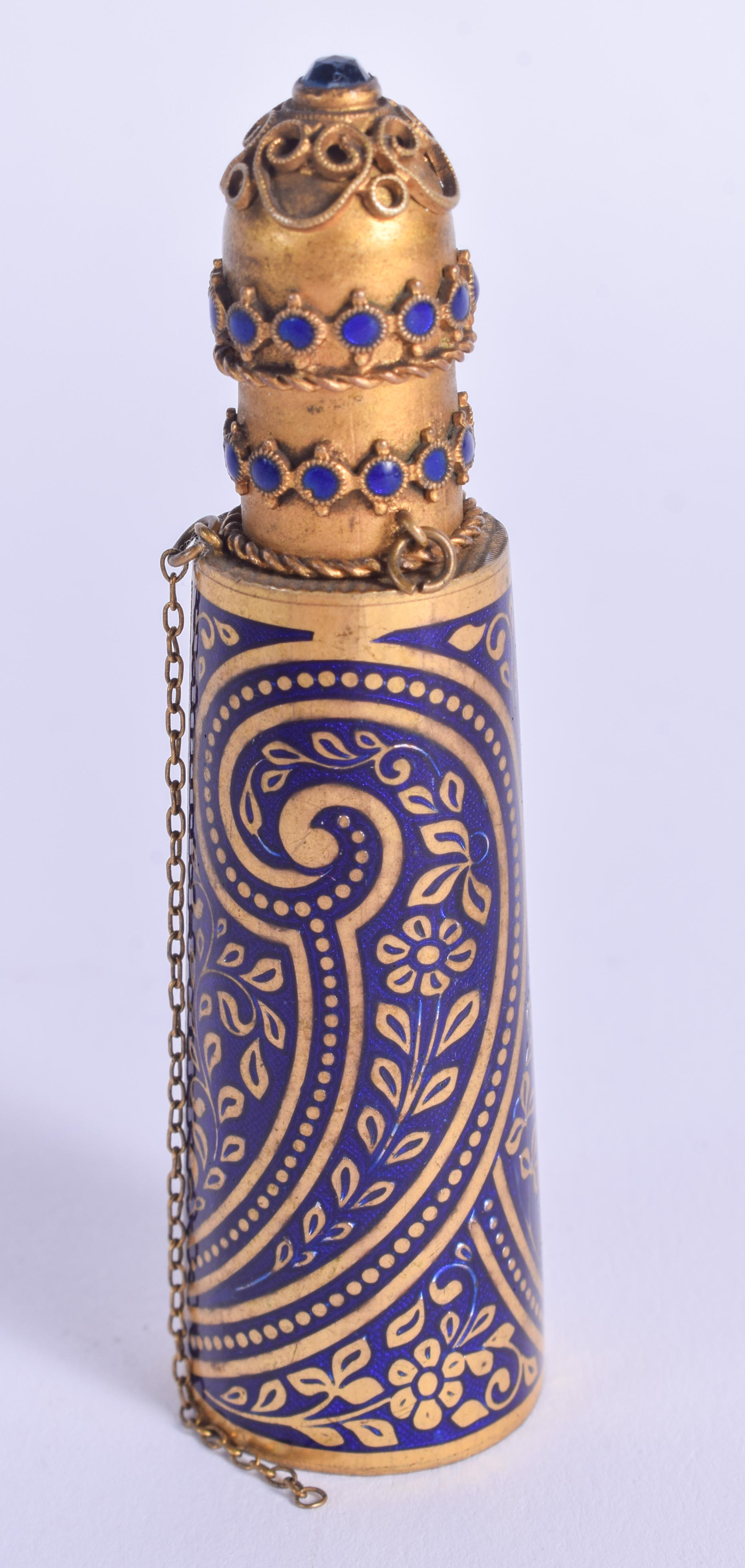 A VINTAGE MIDDLE EASTERN ENAMELLED SCENT BOTTLE. 7.25 cm high. - Image 2 of 3