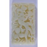 A CHINESE JADE PLAQUE 20th Century. 9 cm x 5.5 cm.