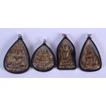 FOUR UNUSUAL SOUTH EAST ASIAN SILVER MOUNTED ICONS. (4)