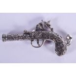 A SILVER DUELLING PISTOL. 6.5 cm wide.